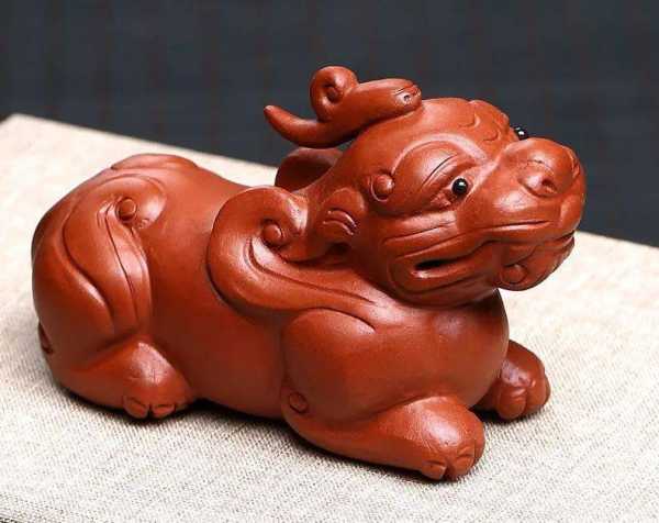 貓貅在茶台上的讲究,茶台上的猫貅摆放,茶台风水与猫貅讲究,第1张
